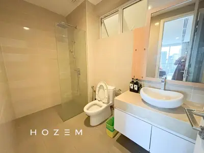 a bathroom with a toilet and a sink and a shower at 2BR3B Hozem KL1602 Apartment KLCC in Kuala Lumpur