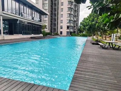 a swimming pool in the middle of a building at Astoria Ampang City Centre in Kuala Lumpur