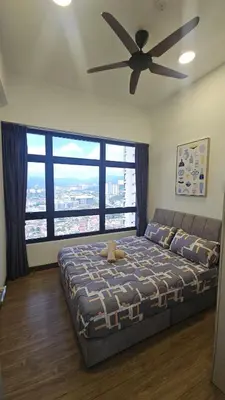 a bedroom with a bed and a ceiling fan at Astoria Ampang City Centre in Kuala Lumpur