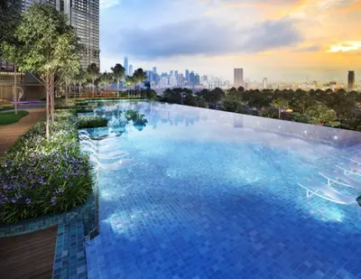 a large swimming pool with a city skyline in the background at M Vertica KL City Fully Air-Con Home in Kuala Lumpur