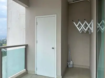 a white door in a room with a window at Elegant Studio - Upscale Neighbourhood of Hartamas in Kuala Lumpur