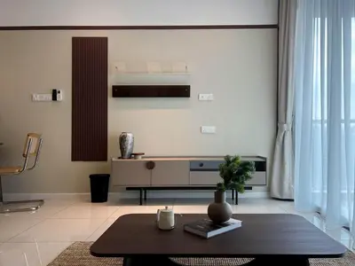 a living room with a table and a couch at Elegant Studio - Upscale Neighbourhood of Hartamas in Kuala Lumpur