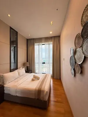 a bedroom with a bed and a large window at Crystal Dorsett Infinity Pool KL in Kuala Lumpur