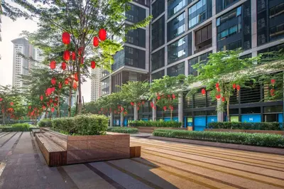 a park with red lanterns in front of a building at netflix&chill Arcoris Soho 2R1B Mont Kiara in Kuala Lumpur