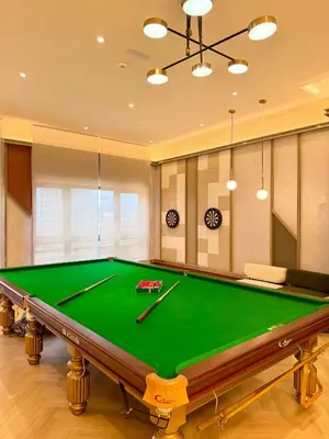 a billiard room with a green pool table at Agile Bukit Bintang Suits TRX Pavilion By Klcc Sky view 60 floor in Kuala Lumpur