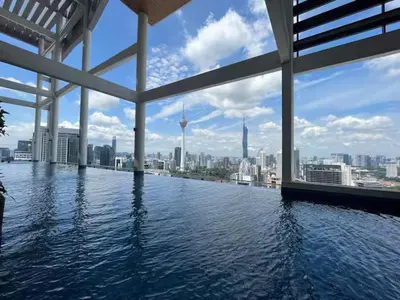 a swimming pool with a view of the city at The Colony By Infinitum J in Kuala Lumpur