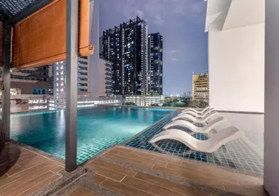 a swimming pool on the roof of a building at New 5 min Gleneagles Hospital 10 min KLCC in Kuala Lumpur