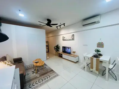 a living room with a couch and a table at Cozy mercu summer suite 5mint WD KLCC luxury apartment free wifi, netfliix in Kuala Lumpur