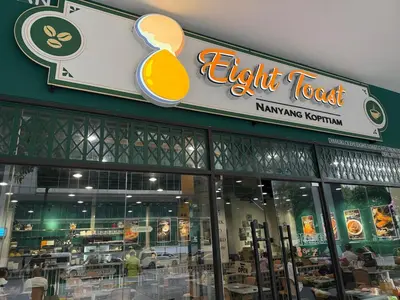 a light restaurant with a sign on the front of it at Trion Skyview Residence KL City Centre in Kuala Lumpur
