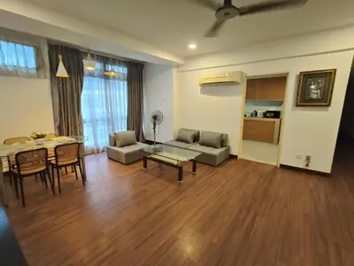 a living room with a couch and a table at Fahrenheit 88 Pavilion TRX 2 BedRoom 2 Bathroom Bukit Bintang in Kuala Lumpur
