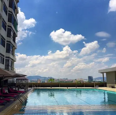 a large swimming pool on top of a building at Fahrenheit 88 Pavilion TRX 2 BedRoom 2 Bathroom Bukit Bintang in Kuala Lumpur