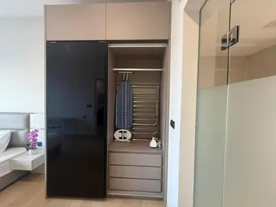 a bathroom with a walk in closet with a shower at Star Residance KLCC by Nexus in Kuala Lumpur