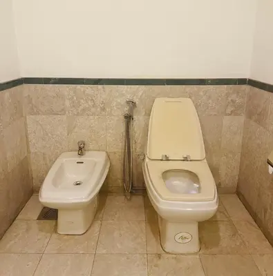 a bathroom with a toilet and a bidet at Times Square Service Suites By Humira in Kuala Lumpur