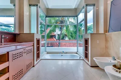 a large bathroom with a tub and a large window at 325 Ritchie by COBNB at Ampang in Kuala Lumpur