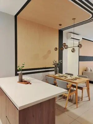 a kitchen with a table and a dining room at M Vertica Elegant Stay in Cheras in Kuala Lumpur