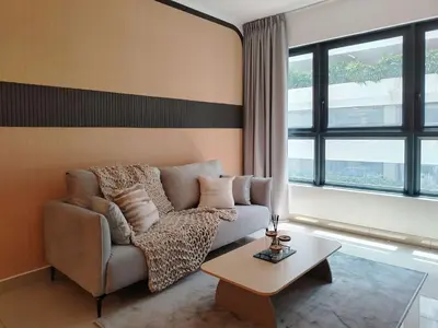 a living room with a couch and a table at M Vertica Elegant Stay in Cheras in Kuala Lumpur