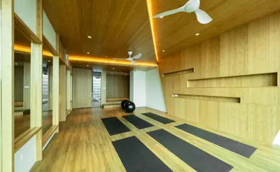a hallway with wood paneling and a ceiling at Tribeca Homestay Bukit Bintang TRX in Kuala Lumpur