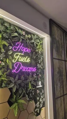 a sign that says hopes fires dreams on a door at Two Bedrooms Bukit Bintang Agile TRX Pavillion Nature Home Netflix Good View #33 in Kuala Lumpur
