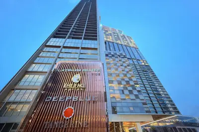 a tall building with the words detroit detroit accelerating at Platinum Suites KLCC by Home stay in Kuala Lumpur