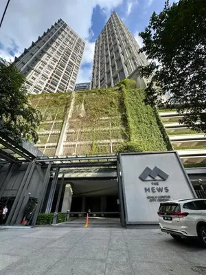 a building with a green wall on the side of it at The Mews KLCC by Luxe Residence in Kuala Lumpur