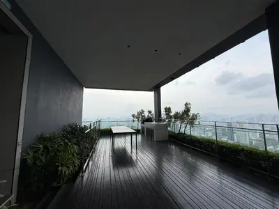 a balcony of a building with a view of the city at Star Residences in Kuala Lumpur
