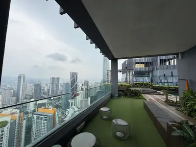 a balcony with a view of a city skyline at Star Residences in Kuala Lumpur