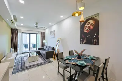 a living room with a table and a couch at The Elements Ampang by Greenhome in Kuala Lumpur