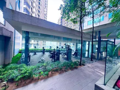 a building with people exercising in a gym at Mercu Summer suites KLCC by JK Privy Homes - 7 Pax Family Stay in Kuala Lumpur