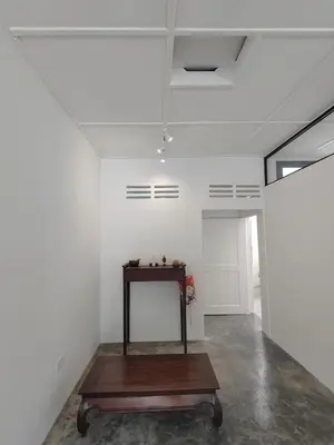 a room with a table in the middle of it at Zen Retreat KL in Kuala Lumpur