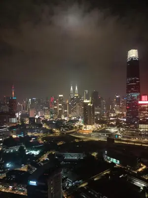 a view of a city at night with at Continew Residence by TM House in Kuala Lumpur