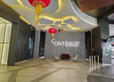 a lobby with a waiting room with a sign on the wall at Continew Residence by TM House in Kuala Lumpur