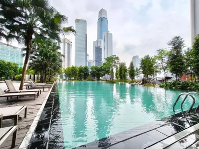 a swimming pool in a city with tall buildings at Agile Residence Bukit Bintang Serviced Suite by LP in Kuala Lumpur