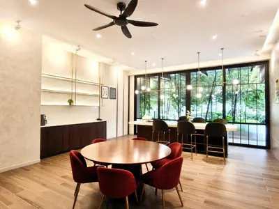 a kitchen and dining room with a table and chairs at Agile Residence Bukit Bintang Serviced Suite by LP in Kuala Lumpur