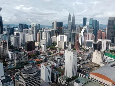 an aerial view of a city with tall buildings at The Signature Suites at Berjaya Times Square KL in Kuala Lumpur