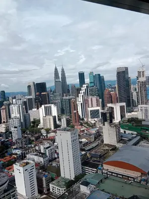 a view of a large city with tall buildings at The Signature Suites at Berjaya Times Square KL in Kuala Lumpur