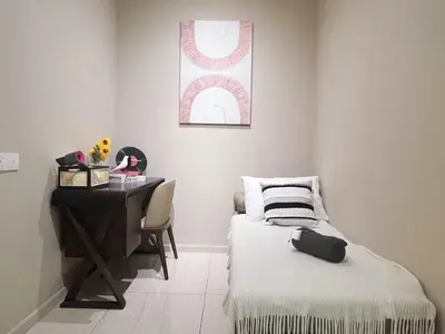 a bedroom with a bed and a desk and a table at Dorsett Hartamas Mont Kiara Kuala Lumpur Mitec by innfinitystay in Kuala Lumpur