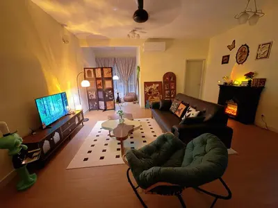 a living room with a couch and chairs and a tv at Cheras KL Velocity Mall VR3 8pax MRT Maluri NAN JING STREET 焦赖吉隆坡 步行1分钟到 双威伟乐城&南京街 可容8人 in Kuala Lumpur