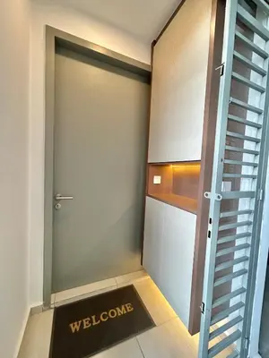 a welcome mat in front of a door with a welcome sign at 3BR KL Sentral L27 Modern Vintage Views in Kuala Lumpur