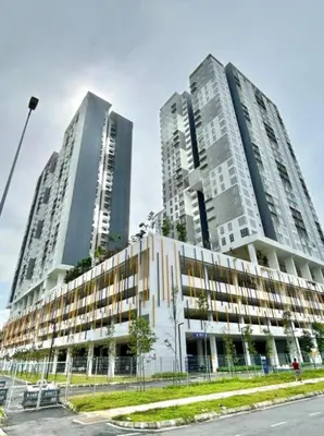 two tall buildings are next to a street at 3BR KL Sentral L27 Modern Vintage Views in Kuala Lumpur
