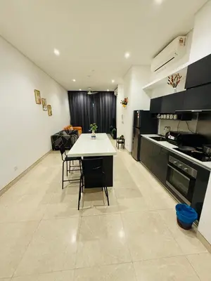 a kitchen with a table and chairs in a room at Lucentia Residence Skyline KL Stay in Kuala Lumpur