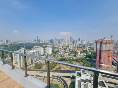 a view of a city from a balcony at Small Studio Neu Suites Gleneagles Ampang KL in Kuala Lumpur