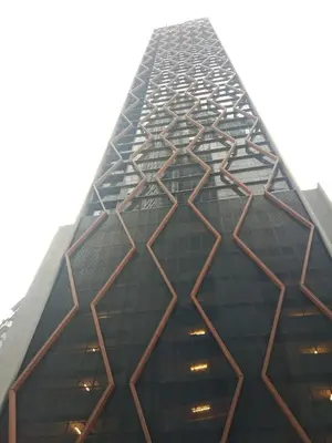 a tall building with a geometric design on it at Scarletz Suites Klcc Twin tower by Lucky in Kuala Lumpur