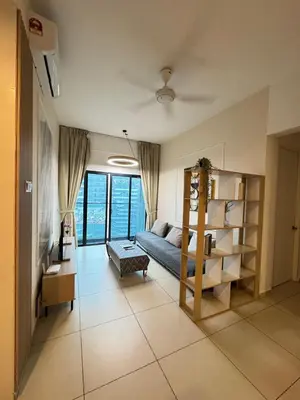 a living room with a bed and a book shelf at Reizz Residence by Ampang Kiri in Kuala Lumpur