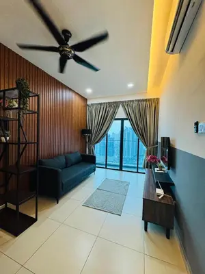 a living room with a ceiling fan and a couch at Reizz Residence by Ampang Kiri in Kuala Lumpur