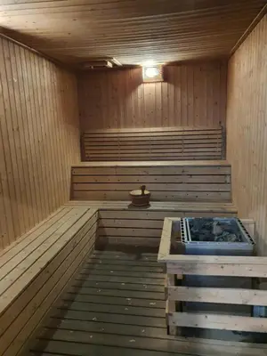 a sauna with a hot tub in the middle at The Robertson Bukit Bintang by TALKS COLLECTION in Kuala Lumpur