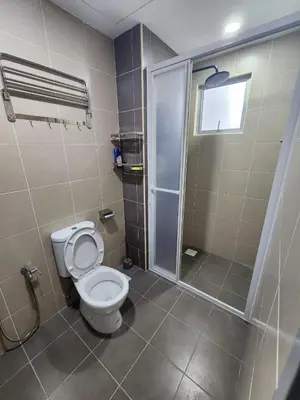 a bathroom with a toilet and a shower at RC Balqis Homestay in Kuala Lumpur