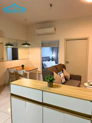 a living room with a couch and a table at Arte Mont Kiara Luxe Suites by Dream'Inn in Kuala Lumpur