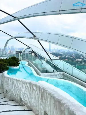 a swimming pool on the top of a building at Arte Mont Kiara Luxe Suites by Dream'Inn in Kuala Lumpur