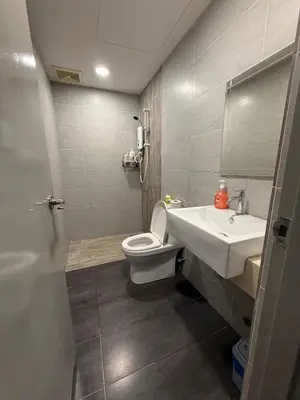 a bathroom with a toilet and a sink at Luxury Affordable at Arte Plus 2BR Near KLCC with WiFi in Kuala Lumpur
