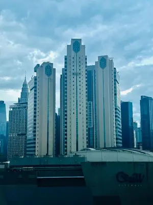 a group of tall buildings in a city at Majestic Residence KLCC By Alfa in Kuala Lumpur